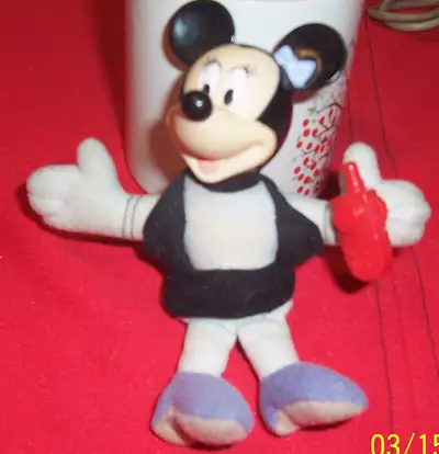 VINTAGE MINNIE MOUSE WITH RADIO BRAND NEW Has a bow in her hair right near ear. Label torn off. Abou...