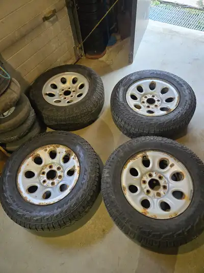 Used set of pirelli 245 70 17 tires on gmc 6 bolt wheels comes with wheel nuts and center caps. $300...