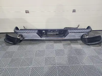 This is a factory GMC SIERRA OR SILVERADO chrome rear bumper in perfect shape, new style with steps...