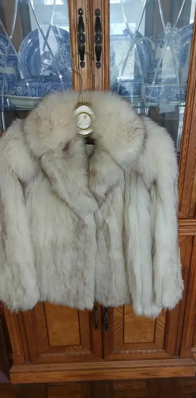 A project:  blue fox fur coat ripped on the back, View more