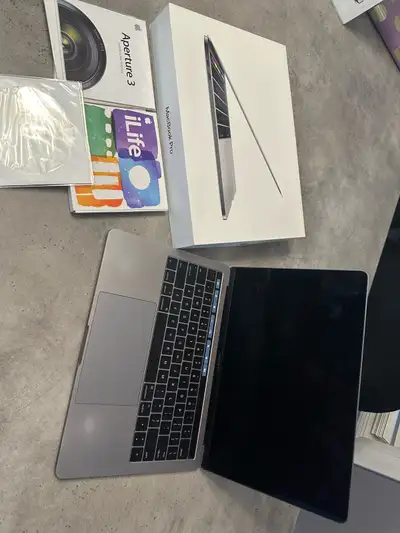 13” Apple MacBook Pro with touch bar , View more