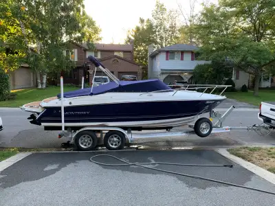 Sport cuddy Double axle trailer Camper top & tonneau Double swim platform 250 HP, Merc cruiser Appro...