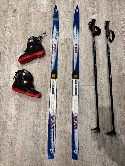 This rare to find package consists of 120 cm skis with SNS bindings, Fisher boots size 13 / 31 EU, a...