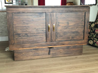 Beautiful solid wood queen size murphy bed.