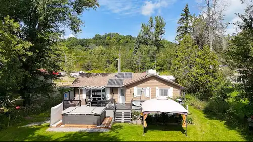 Forget the seasonal "cottages" that cost $10k/year to heat. 106 Canal Lane is a high-performance, fu...