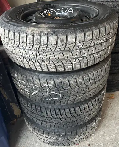 Off a Mazda3 Size: 205/60R16 Center Bore / Hub Bore: 67.1 mm Bolt Pattern: 5x114.3 ** 2 Tires measur...