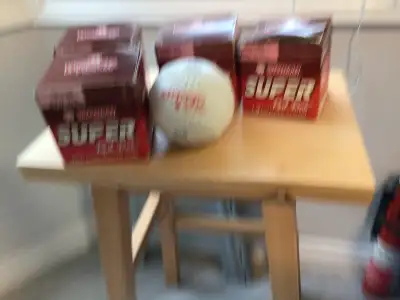 5 New Worth Red Dot Softballs, View more