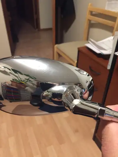 Right side mirror off of a 2006 Suzuki Boulevard. Fits several model years. A couple of marks on it,...
