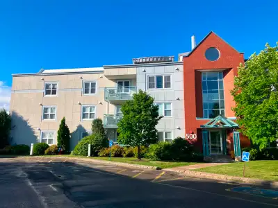 Southside Condo: 835 sq. ft., Concrete Building , Elevator, Underground Parking , n-Suite Laundry 50...