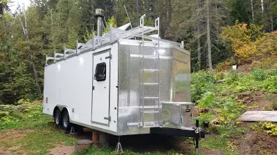 $64K invested. Selling for $45K. 4-season RV/toy hauler/hunting trailer. Custom 8’ x 20’, 2021 Charm...
