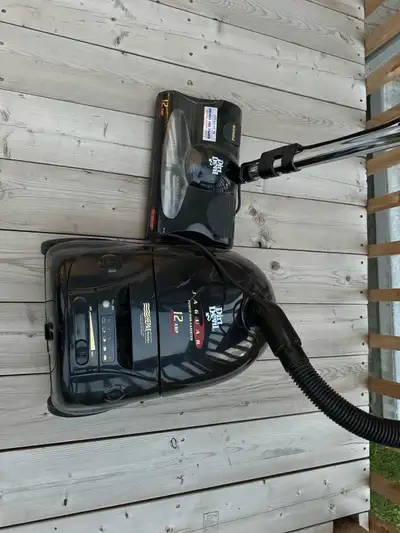 This is a used Dirt Devil Jaguar vacuum, 12 amps of power for powerful suction. It's in fair conditi...