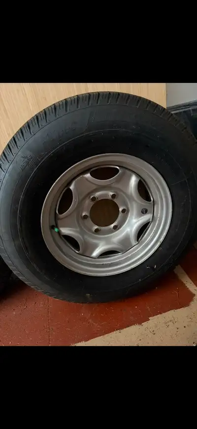 I have 2 spare tires off an RV. Sizes in pics. Asking $199.99 each!