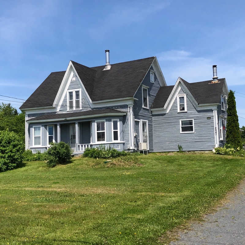 Farmhouse Homestead with Barn & Detached Garage on 27 Acres Houses