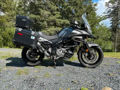 2015 Suzuki VStrom 650 (DL 650) with black aluminum luggage (sides and top box), crash bars, fog lig...