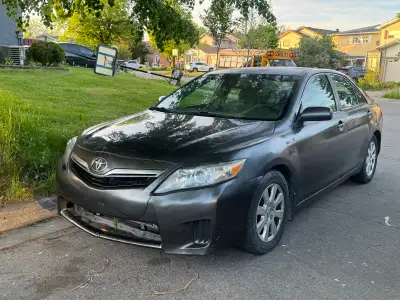 I m selling my own car run and drive very good no issue batery hybrid good Please serios buyer No ac...