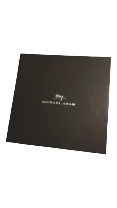 I am selling a used Michael Aram box. It's a stylish and sturdy storage solution, perfect for keepsa...