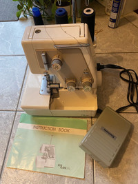 Janome mylock 203 serger sewing machine.