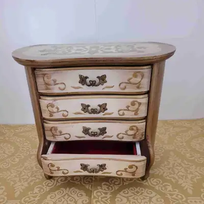 Wooden vintage 1960s 4 drawer jewelry/musical box, made in Japan, top has scroll design in gold, wid...