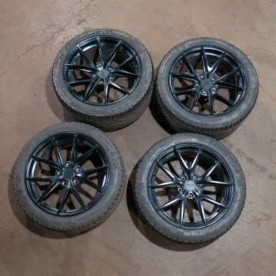 Selling these wheels that come with 3 Porsche tire bags