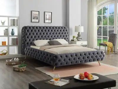 Elevate your bedroom with this brand new, luxurious queen-size bed frame featuring a button-tufted h...