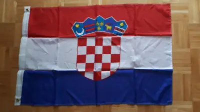 2 x 3 ft flag with grommets. New in package
