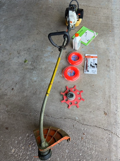 Selling as I purchased a 12v trimmer. Worked last summer but needs carburetor cleaning. Includes 2 p...
