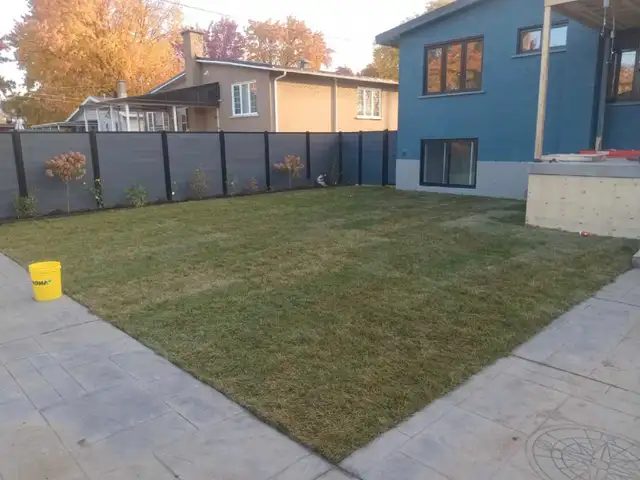paved road,wall,lawn,fence,terrace,hut,hedge,field,temporary62863244212995123