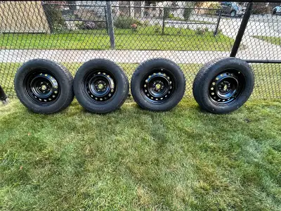 For sale - BF Goodrich, Winter TA tires on OEM - Toyota steel rims with covers. Rim size is J16x6.5...