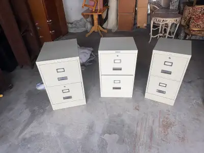 Free delivery used Three Metal 2-Drawer Filing Cabinets, View more