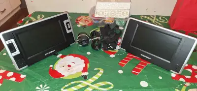 Selling good condition, dual portable dvd players. Excellent for the kids to watch movies while trav...