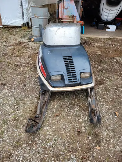 Parting out a mid 70s Mercury snowmobile. Engine being used for another project. Track is a 128 x 15...