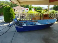 Smokercraft boat and motor