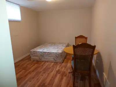 Sharing and single room available for female students or couples in a large basement. Kitchen and wa...