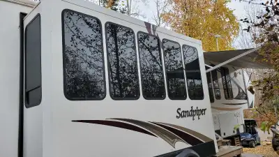 42 ft, Forest River, Sandpiper fifth wheel. It is in great condition. It is parked at our lake lot b...