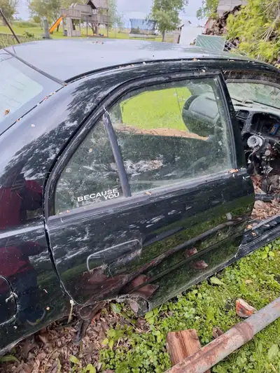 For 1996-97 Mitsubishi Lancer Evolution IV. Looks to be straight and undented, glass is good. Black...
