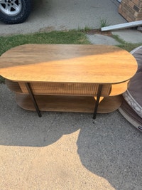 Oval lift top coffee table