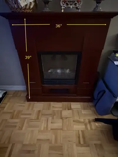 Electric fireplace/ heater 36" wide by 39" high choice of corner or flat on the wall 75$ no delivery...