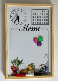 Magnetic memo board with clock