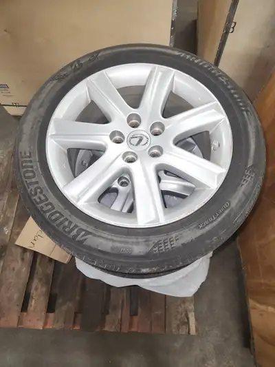 Original Lexus rims with Bridgestone tires. Lots of tread left. Stored indoors, only used in summer.