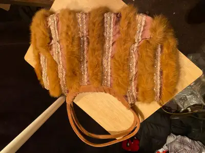 Brown furry purse  , View more