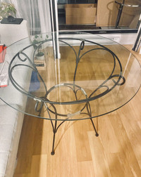 Round glass table with metal frame