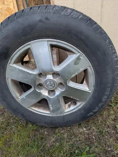 Selling tires with rims from Toyota Sienna. Size 215 65 16. About 50% tread. Please text if need mor...
