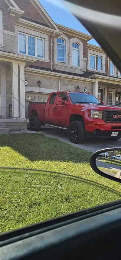 This 2012 GMC Sierra tow truck is ready to get to work, featuring a powerful gas engine and a sturdy...