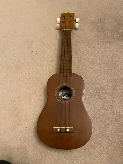 This JHS & Co. vintage ukulele, model 11K20N, is a charming little instrument ready for a new home!...