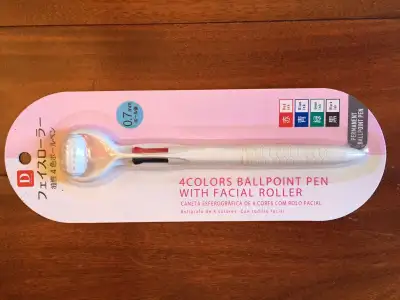 PRICE REDUCED !!! 4 Colour Ballpoint Pen with Facial Roller from Japan. Brand new, sealed. NOW ONLY...