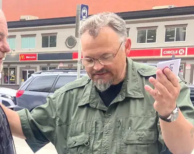 Christian street evangelising., View more