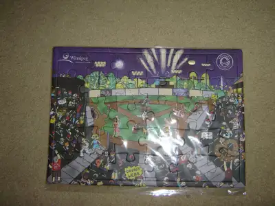 2 jigsaw puzzles. New. In original packaging. 30 pieces. Cartoon depiction of Shaw/Blue Cross Park d...