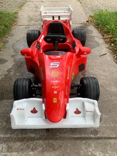 Kids Ferrari Fiat Car! Driven only twice and come with charger. Looking to get $50 , OBO. Contact me...