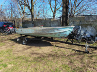 14 ft aluminum boat, trailer and motor.