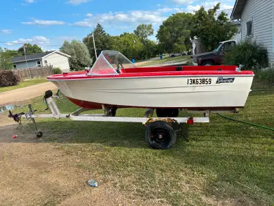Looking to sell my 14 foot boat and tilt trailer, No seats or motor, No holes or leaks, newer floori...